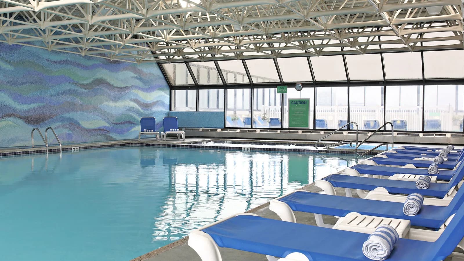 Glass-enclosed indoor pool at the Flagship Resort